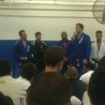 Prof. Roger Gracie awards a black belt to one of his Kensington, London, England students. Prof. Roger Gracie awards a black belt to one of his Kensington, London, England students.
